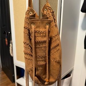 linea pelle fringe suede pouch handbag